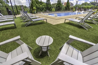 Lounge chair seating next to pool