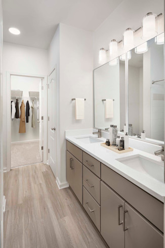 Bathrooms with double sink vanities at Camden Westwood apartments in Morrisville, NC