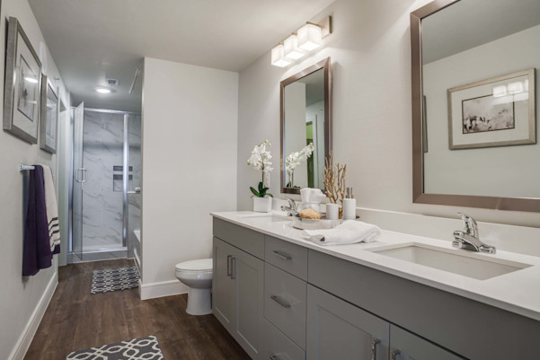 Villas bathroom with light cabinets and double sinks