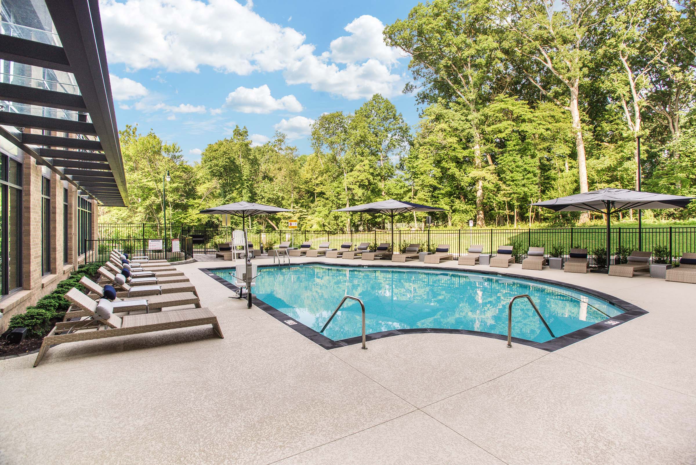 Pool with deck chairs