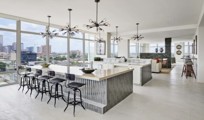 Sky lounge kitchen with skyline views