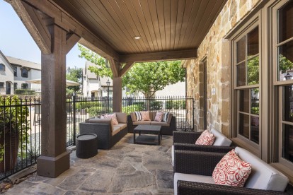 Poolside, covered patio lounge at Camden Brushy Creek apartments in Austin, TX