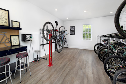 Bike room with storage and repair tools at Camden Ballantyne in Ballantyne, NC