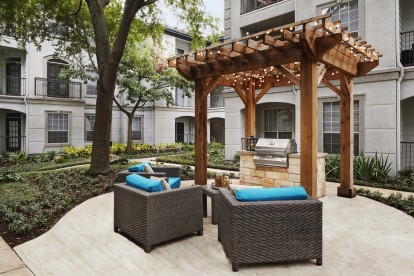 Outdoor grilling area with seating 