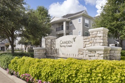 Monument Sign of Camden Spring Creek Apartments in Spring, Texas. 