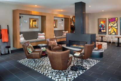Resident Lounge with Double-Sided Fireplace and ample seating