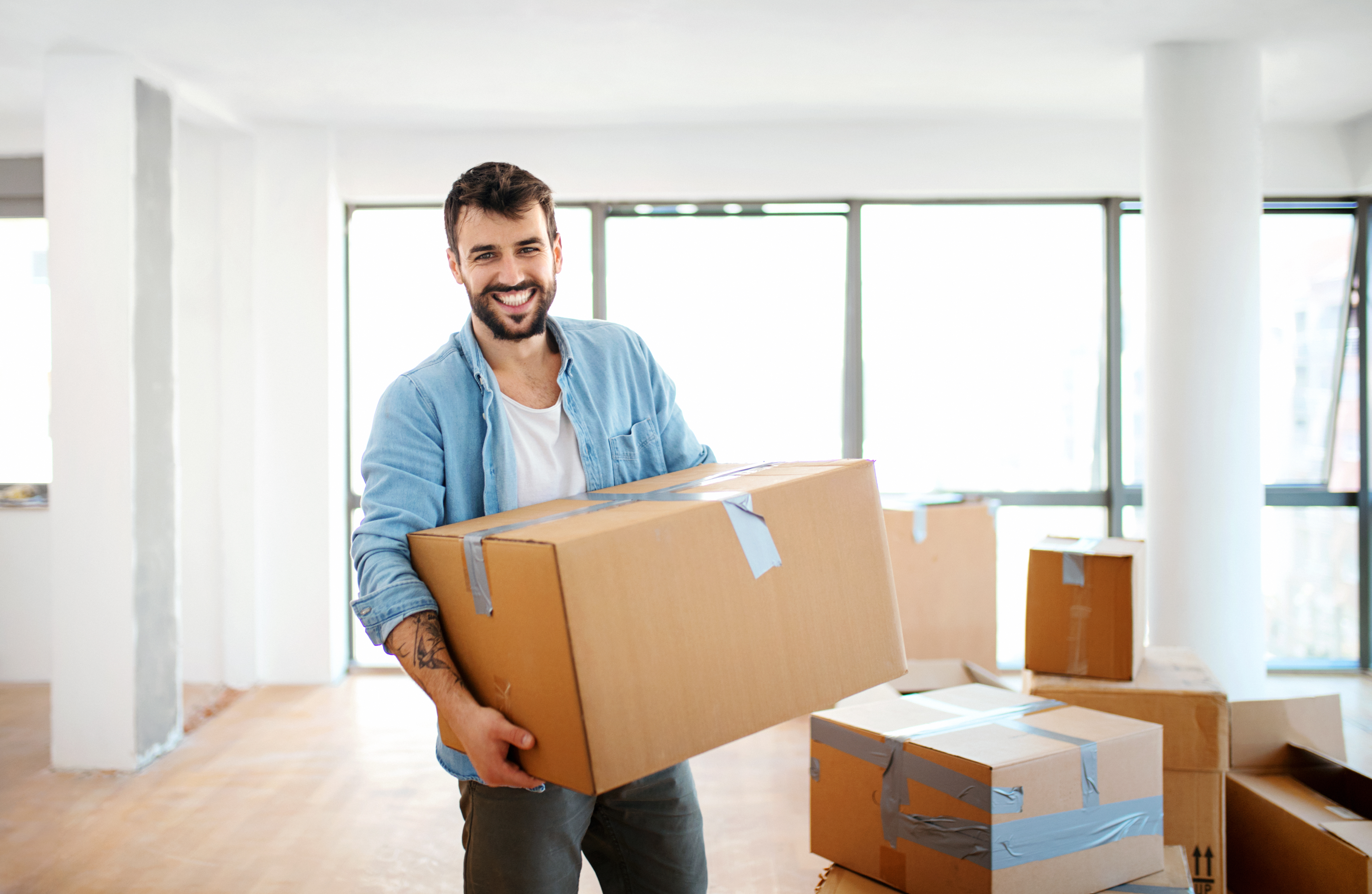 Photo of man with moving box 