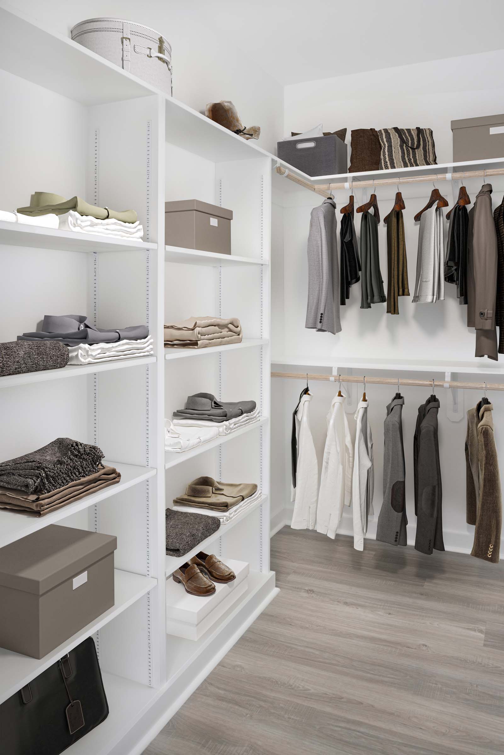 White contemporary apartment closet with built-in shelving at Camden Grandview in Charlotte, NC
