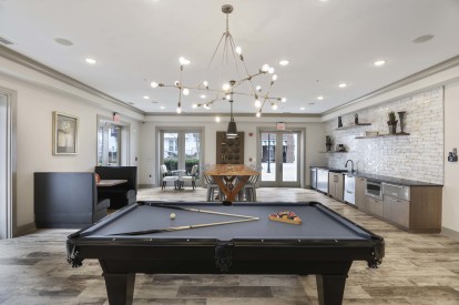 Resident lounge with pool table and entertaining kitchen