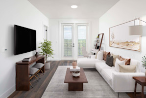Living room with wood-style flooring at Camden West Nashville apartments in Nashville, TN