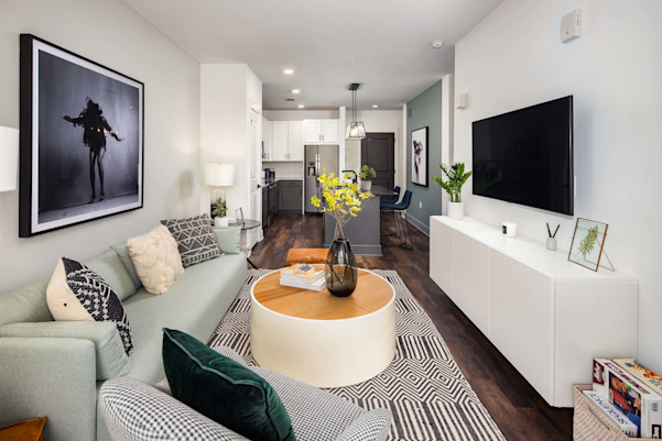 Living room with wood-style flooring at Camden West Nashville apartments in Nashville, TN