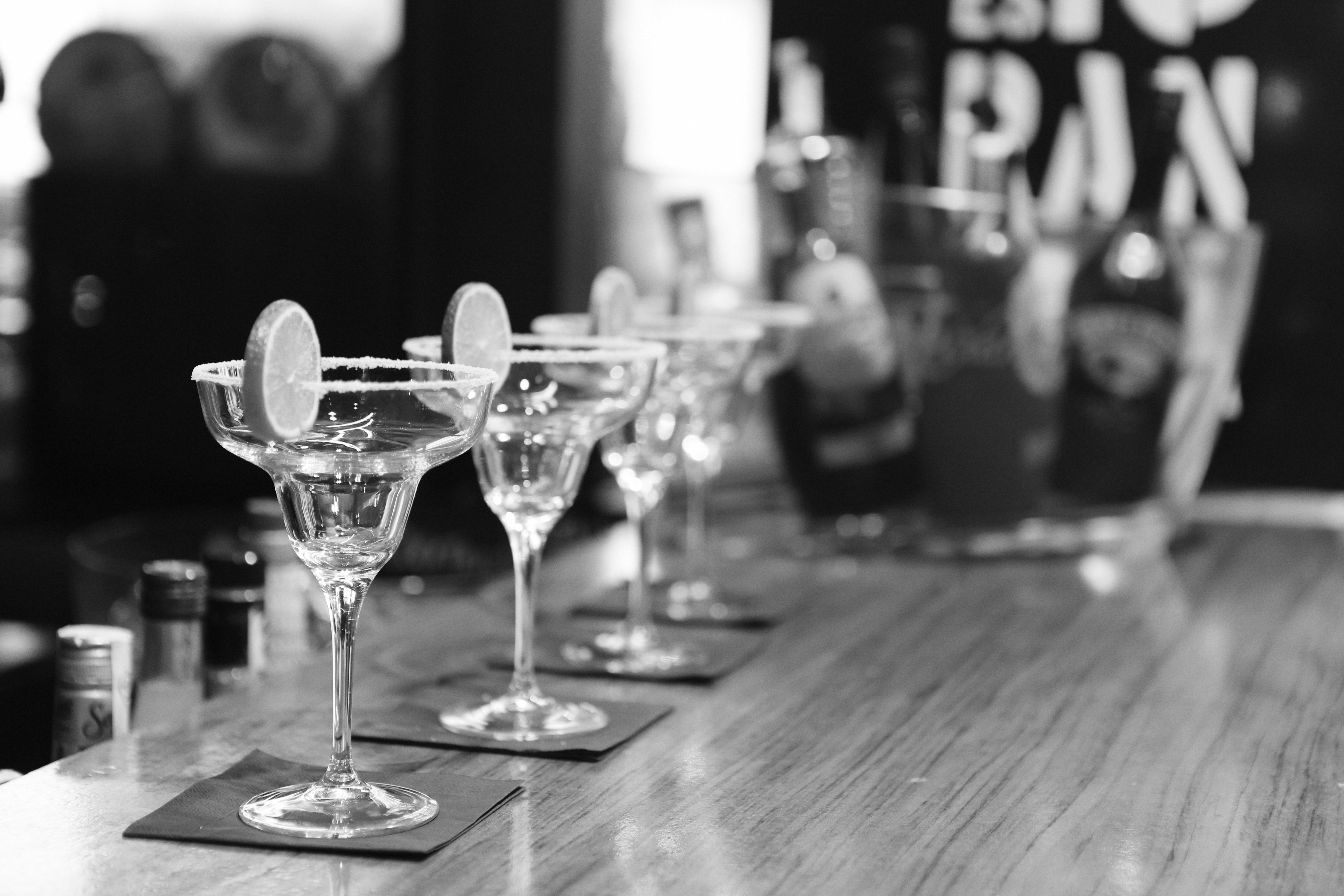 black and white with empty margarita glasses on a bar
Photo courtesy of Pexels
https://www.pexels.com/photo/grayscale-photography-of-margarita-glass-on-table-4295/