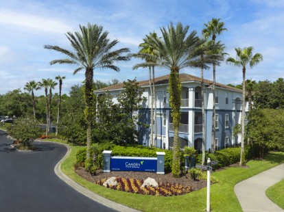 Entry to Camden World Gateway apartment community in Orlando, FL