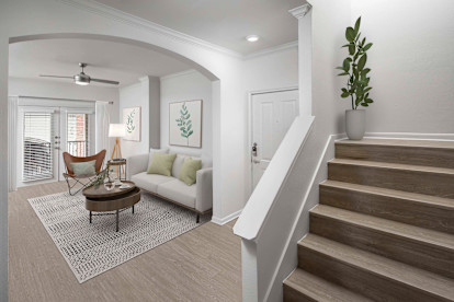 Townhome entry and stairs to second floor at Camden Farmers Market in Dallas, Tx