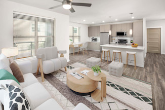 Spacious living rooms with access to private balconies at Camden Washingtonian apartments in Gaithersburg, MD
