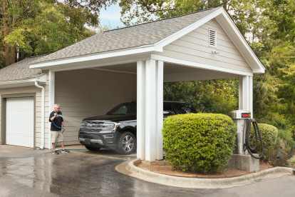 Outdoor, covered car wash at Camden Lake Pine apartments located in Raleigh, NC. 