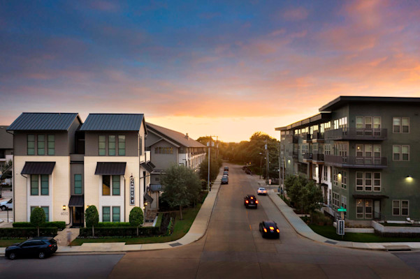 Twilight view of both sides of the community
