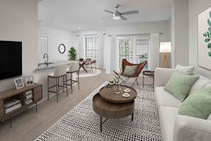 Townhome living room with wood-style floors at Camden Farmers Market in Dallas, Tx