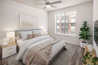 Bedroom with lighted ceiling fan at Camden Washingtonian apartments in Gaithersburg, MD
