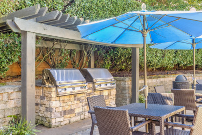 BBQ grills by the pool at Camden Sedgebrook