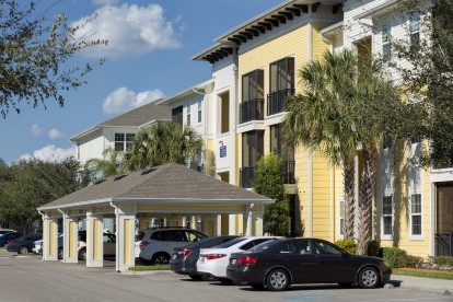 Open parking with covered spaces