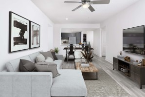 Living, dining, and kitchen with wood-style flooring and ceiling fan at Camden Brickell apartments in Miami, FL