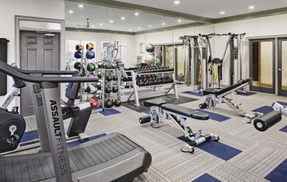 24 hour fitness center cardio equipment and free weights