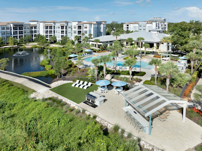 camden clearwater apartments clearwater, fl pool, outdoor grill, and pond