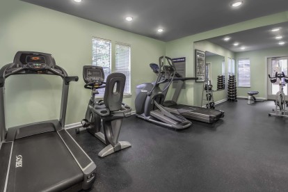 24-hour fitness center with cardio equipment