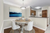 Dining area with hardwood-style flooring