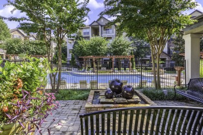 Outdoor relaxation lounge area adjacent to our beautiful pool at Camden Asbury Village in Raleigh, NC