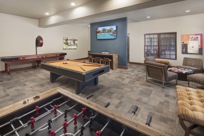 Second clubhouse game room with billiards, shuffle board and foosball 
