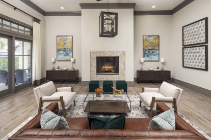 Clubroom with fireplace at Camden Woodson Park in Houston, TX