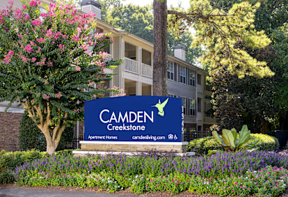 Community entrance with monument sign at Camden Creekstone in Atlanta GA