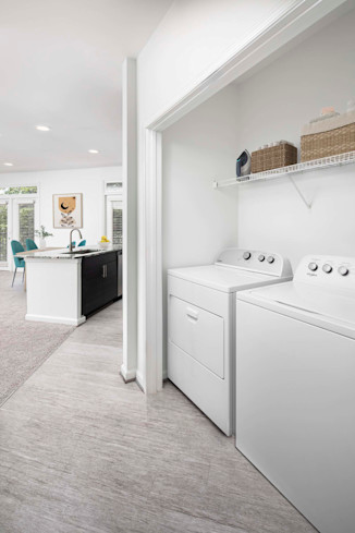 Full-size washer and dryer in every apartment home at Camden Monument Place apartments in Fairfax, VA