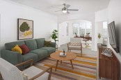 Living room and flex space at Camden Montague apartments in Tampa, FL