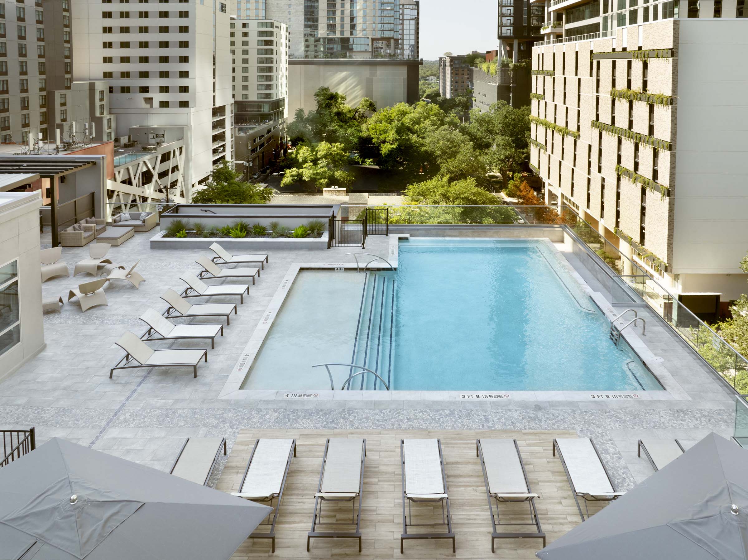 Rooftop pool overlooking Rainey Street at Camden Rainey Street apartments in Austin, TX