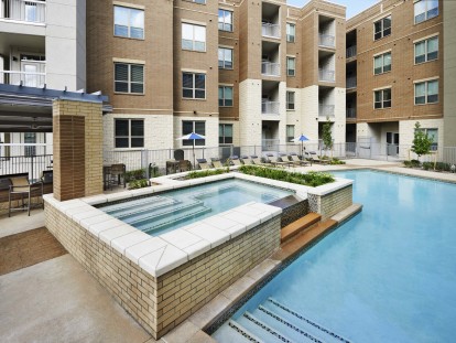 Resort style swimming pool hot tub at Camden Lincoln Station Apartments in Lone Tree, CO