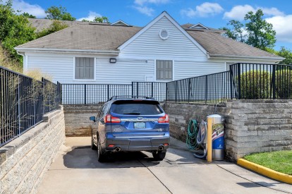 Car care area with vacuum and wash station.