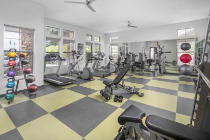 Fitness center with cardio and strength training equipment