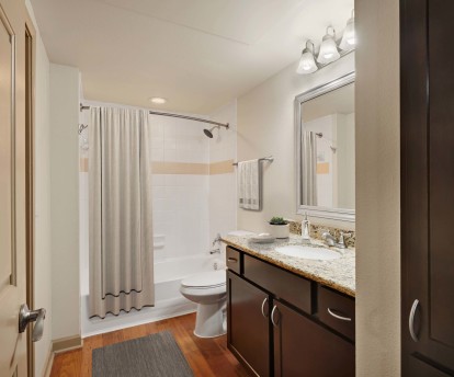 Single Vanity Bathroom with Stand up and Bathtub Combination at Camden Greenway Apartments in Houston, TX