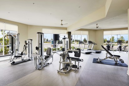 Fitness center exercise equipment at Camden Lincoln Station Apartments in Lone Tree, CO