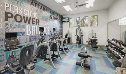 24 hour fitness center with cardio strength training equipment and free weights