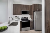 camden san marcos apartments scottsdale az kitchen with quartz countertops and stainless steel appliances