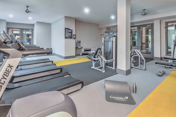 Fitness center with cardio and strength training equipment