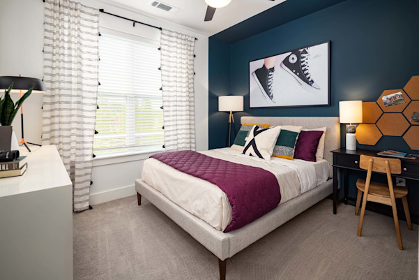 Bedroom with carpet and space to work from home at Camden West Nashville apartments in Nashville, TN