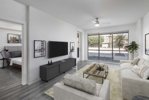 Camden Tempe West Apartments in Arizona Living Room with floor to ceiling windows and lighted ceiling fan in Live/Work Apartment Home