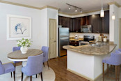 Dining room and kitchen with pantry and energy efficient stainless appliances
