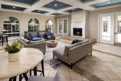 Camden Crown Valley Apartments Mission Viejo CA Resident Clubhouse with Fireplace and Seating Areas