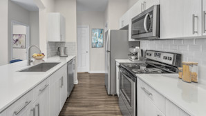 Kitchen with stainless steel appliances at Camden Governors Village Apartments in Chapel Hill, NC